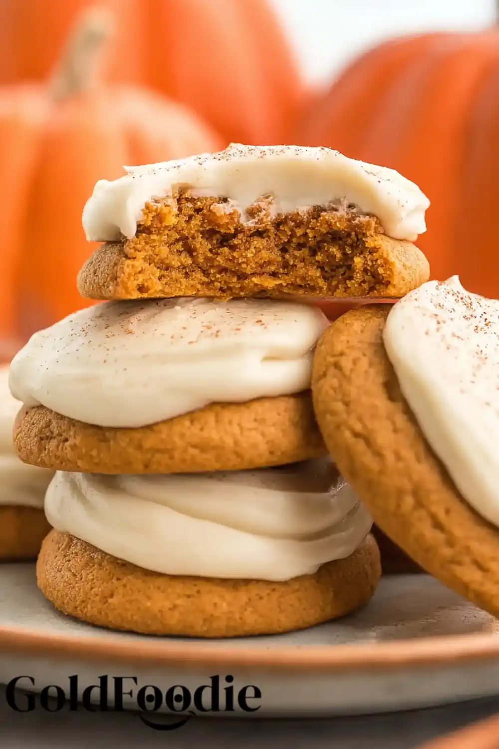 Soft Pumpkin Cookies with Cinnamon Frosting 5 Pumpkin cookie with visible soft center and frosting