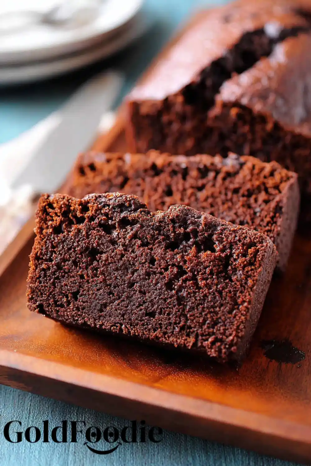 Gluten-Free Vegan Chocolate Banana Bread 5 Slice of chocolate banana bread showing soft texture.
