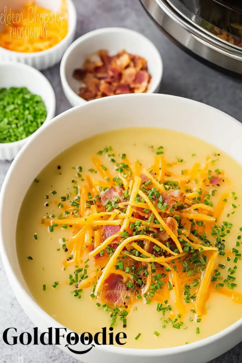 Soup with Chives and Bacon Creamy potato soup topped with cheddar, bacon, and chives