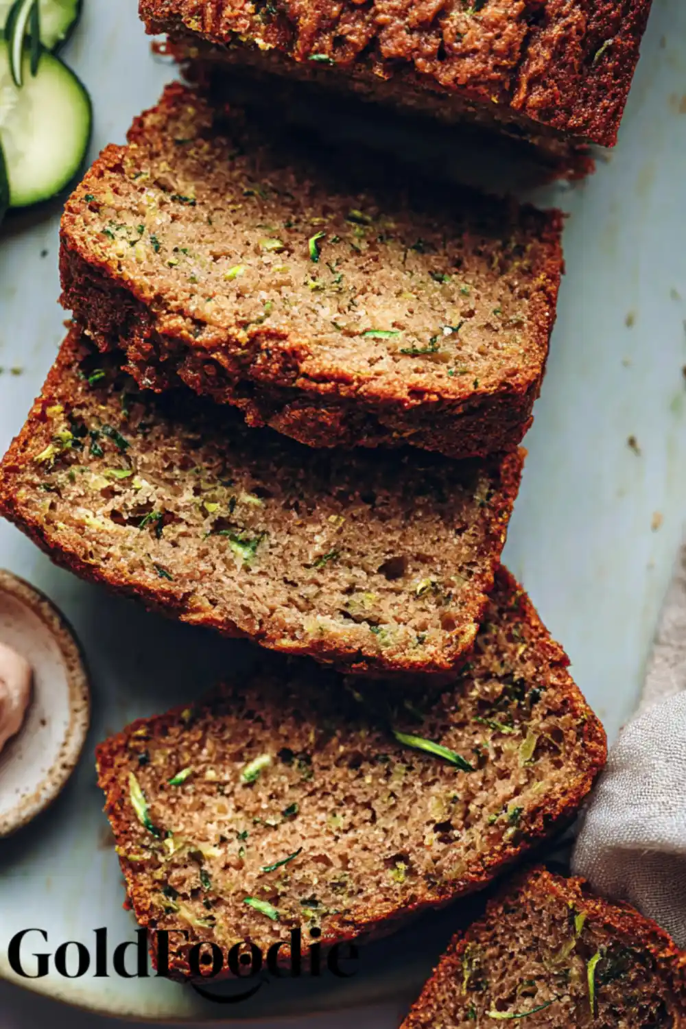 Stack of Zucchini Bread Slices A stack of three thick slices of healthy vegan zucchini bread.