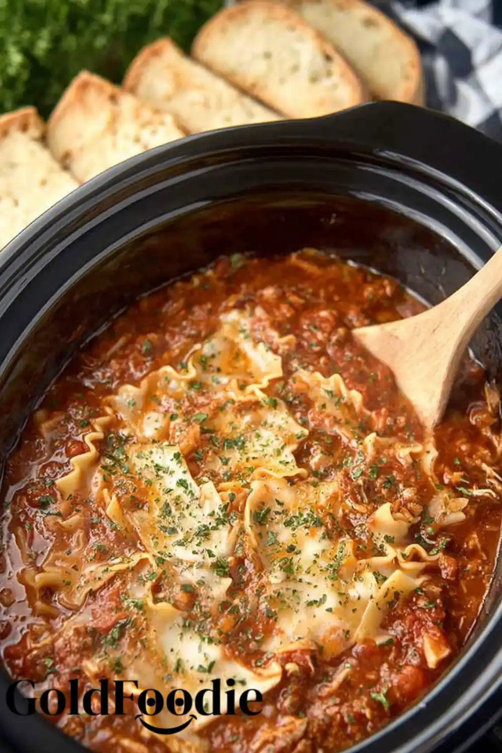 Crock pot Lasagna Soup 5 Crock pot lasagna soup with bubbling cheese and garlic bread