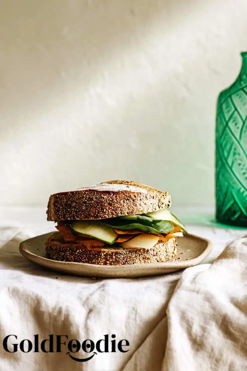 Vegan Buckwheat Bread Sandwich Seeded Buckwheat Bread sandwich with greens and vegetables.
