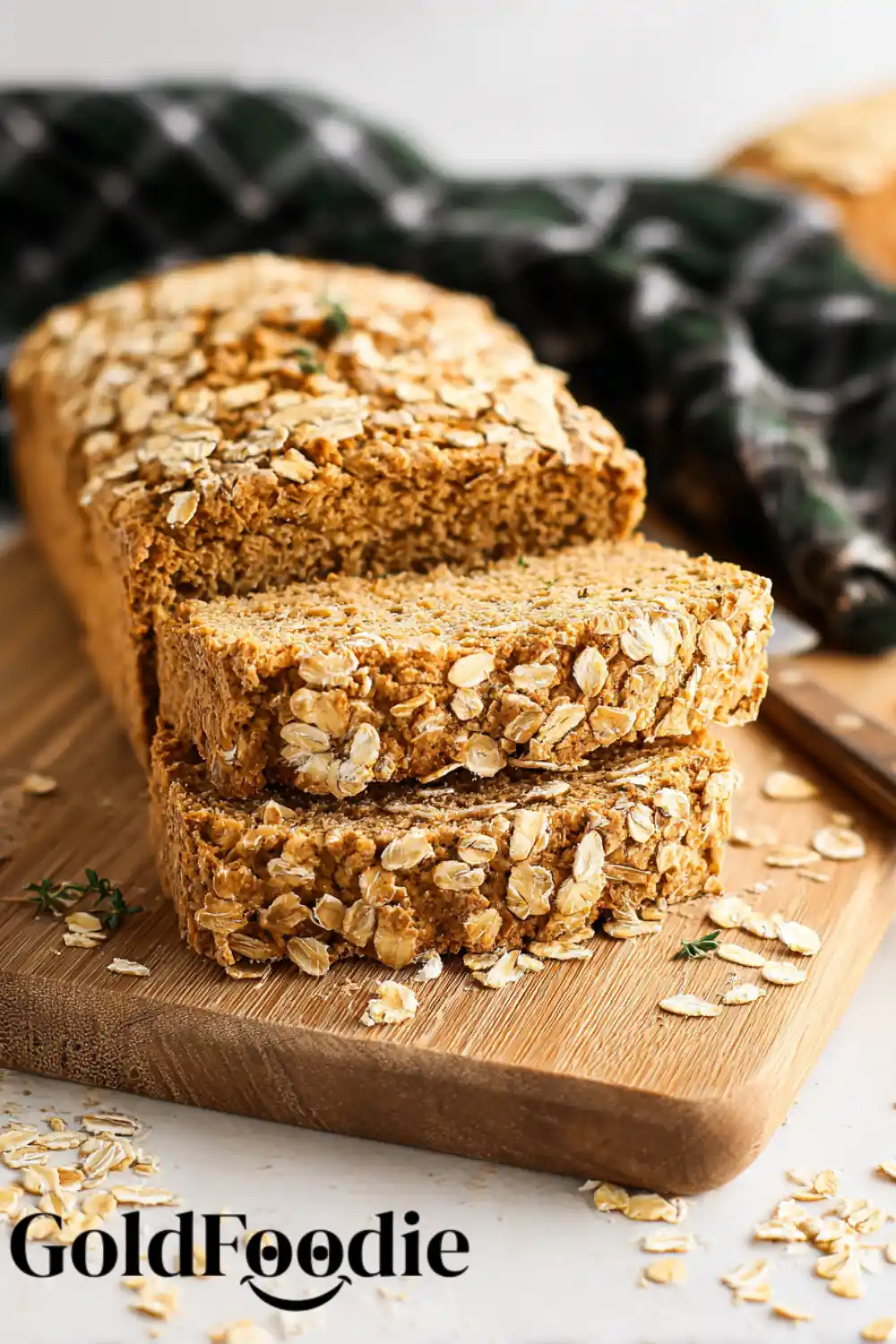Vegan Oat Bread Loaf Gluten-free oat bread with oats sprinkled on top.