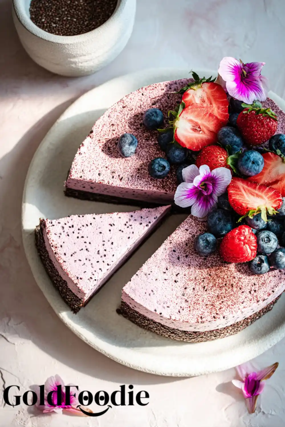 Whole Chia Cake with Berries Whole berry chia seed cake gluten free with a slice cut out.