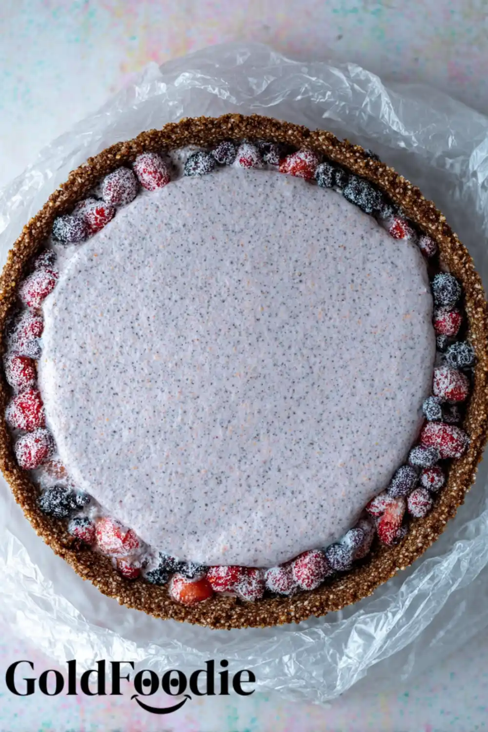 Whole Vegan Chia Seed Cake Top View Overhead view of full vegan chia seed cake with crust and berries